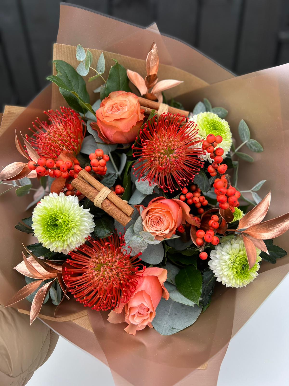 Clementine and Cinnamon Hand tie Bouquet